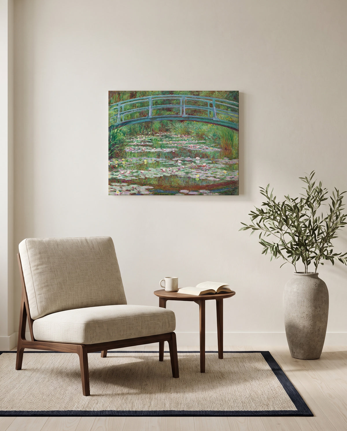 The Japanese Footbridge by Claude Monet as a stretched canvas above a linen lounge chair in a reading corner