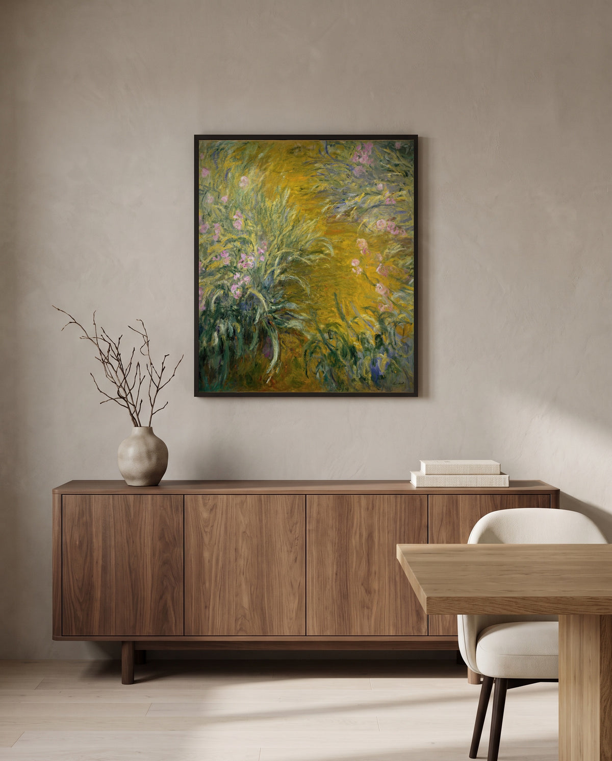 The Path through the Irises by Claude Monet in a black frame above a walnut sideboard in a dining room
