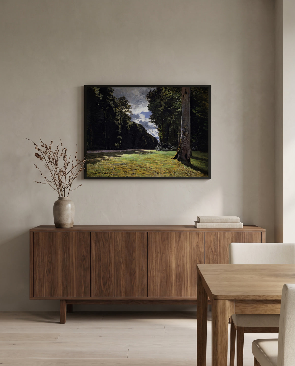 The Pavé de Chailly by Claude Monet in a black frame above a walnut sideboard in a dining room