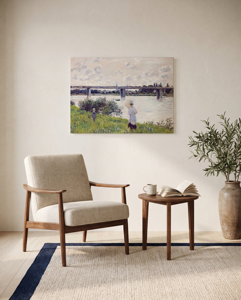Promenade, Railroad Bridge by Claude Monet as a stretched canvas above a linen lounge chair in a reading corner