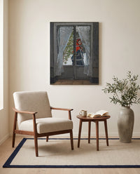 The Red Kerchief by Claude Monet as a stretched canvas above a linen lounge chair in a reading corner