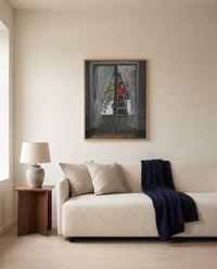 The Red Kerchief by Claude Monet framed in natural oak above a cream sofa in a warm living room