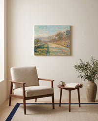 Road to La Roche-Guyon by Claude Monet as a stretched canvas above a linen lounge chair in a reading corner
