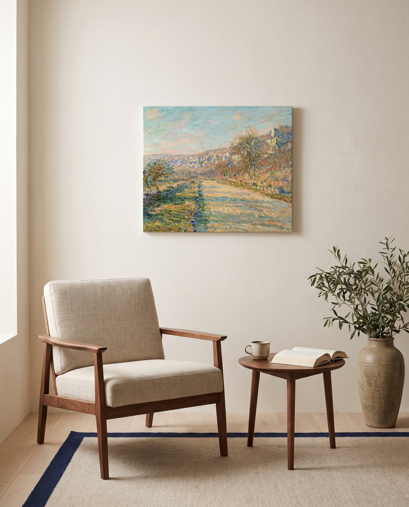 Road to La Roche-Guyon by Claude Monet as a stretched canvas above a linen lounge chair in a reading corner
