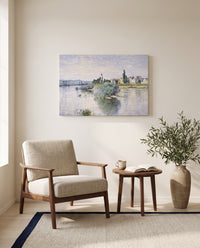 The Seine at Lavacourt by Claude Monet as a stretched canvas above a linen lounge chair in a reading corner