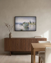 The Seine at Lavacourt by Claude Monet in a black frame above a walnut sideboard in a dining room