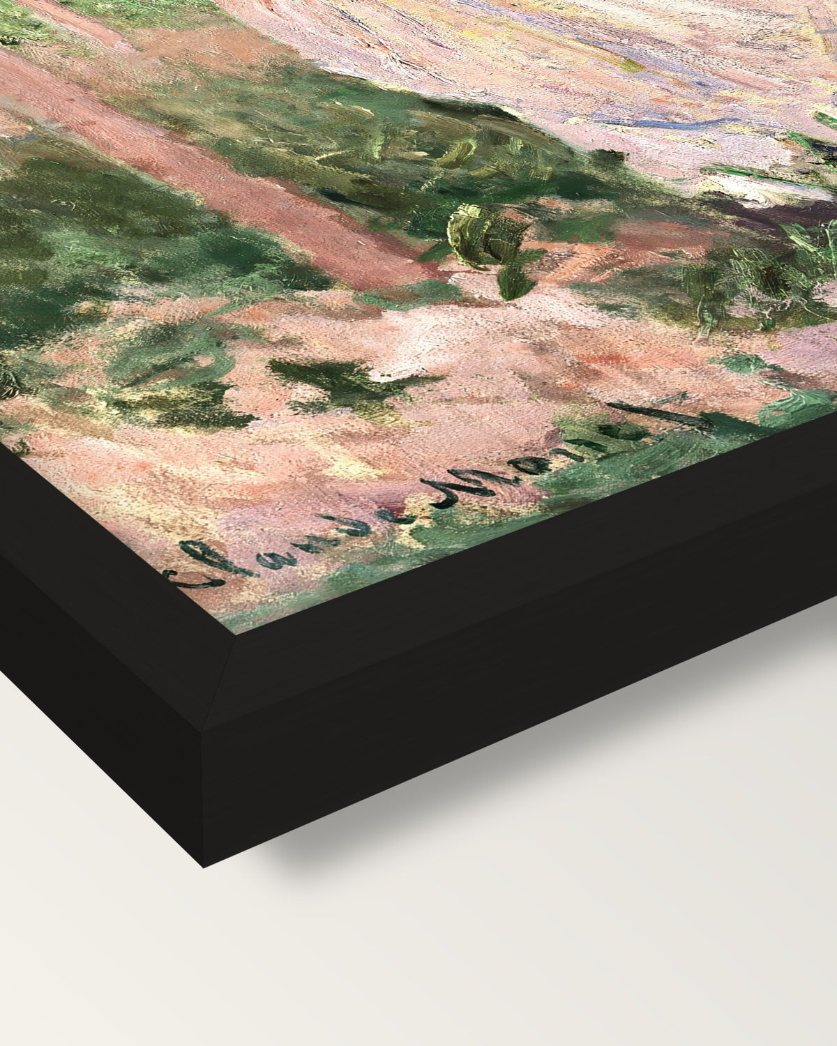 The Stroller by Claude Monet framed print, corner close-up: black moulding, mitred, the print set just below its edge