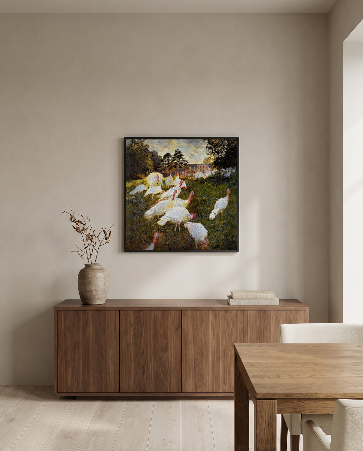 The Turkeys by Claude Monet in a black frame above a walnut sideboard in a dining room