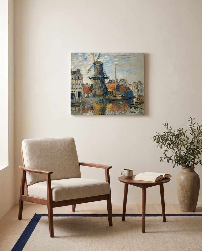 Windmill, Amsterdam by Claude Monet as a stretched canvas above a linen lounge chair in a reading corner