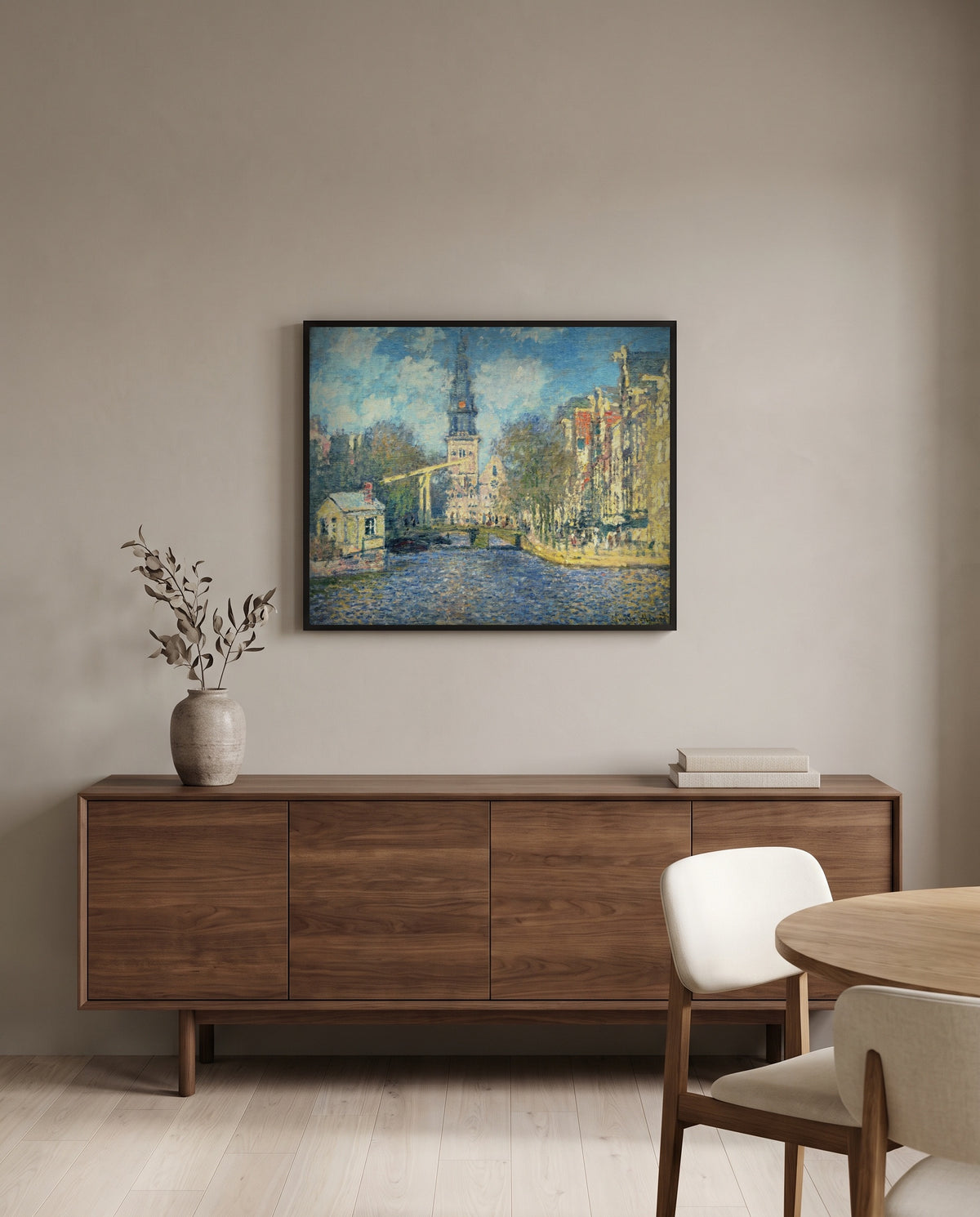 The Zuiderkerk, Amsterdam by Claude Monet in a black frame above a walnut sideboard in a dining room