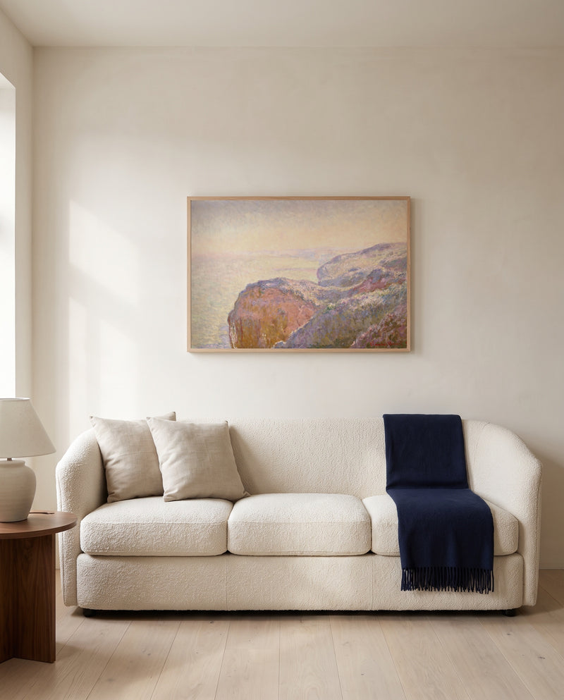 Val-Saint-Nicolas, Morning by Claude Monet framed in natural oak above a cream sofa in a warm living room