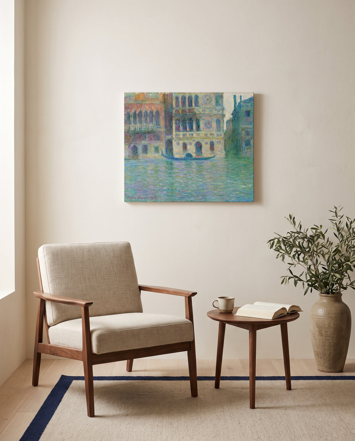 Palazzo Dario by Claude Monet as a stretched canvas above a linen lounge chair in a reading corner
