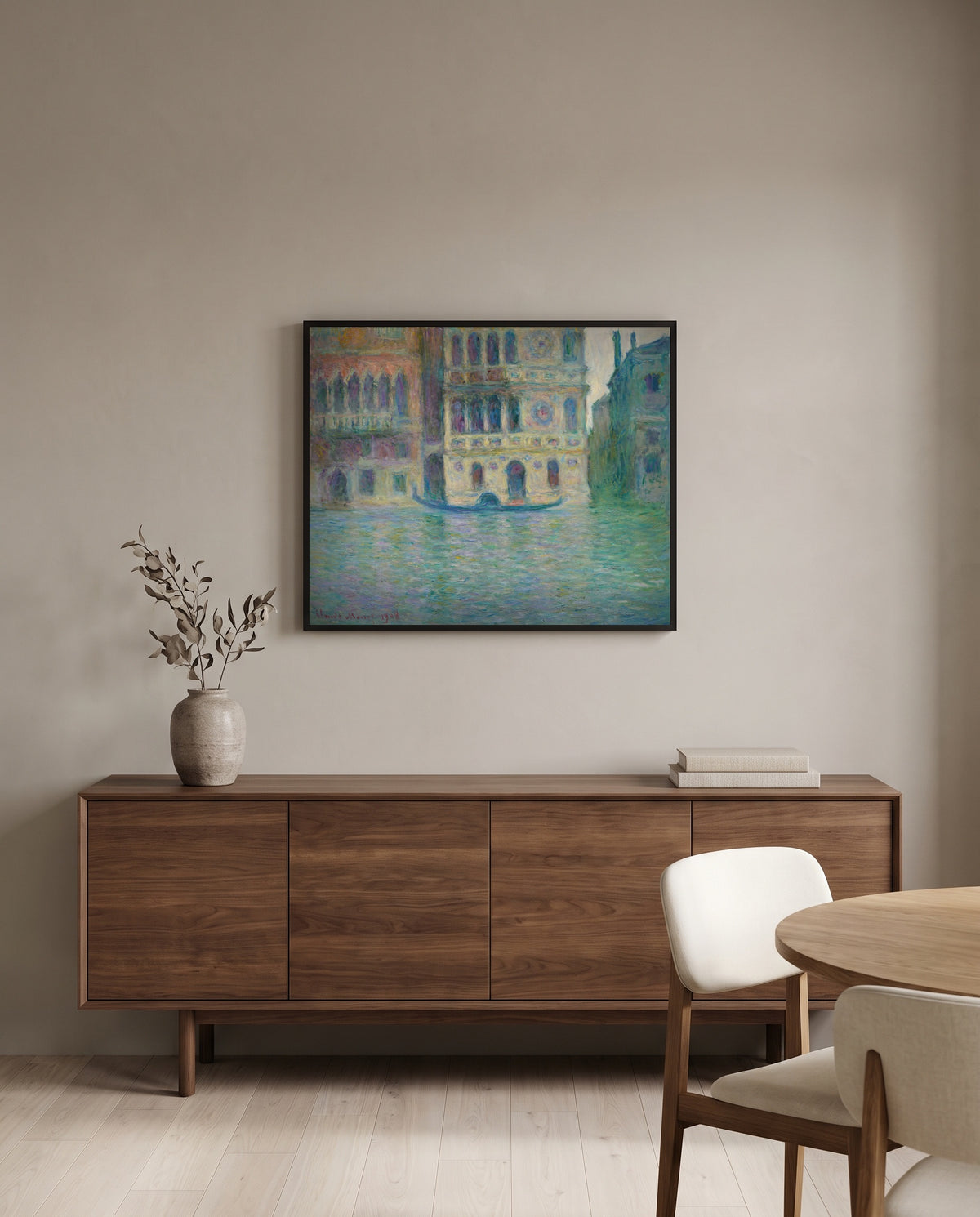 Palazzo Dario by Claude Monet in a black frame above a walnut sideboard in a dining room