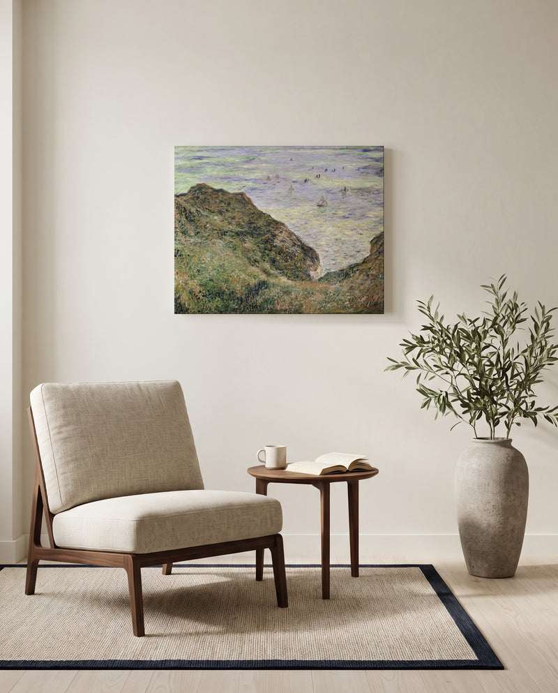 View over the Sea by Claude Monet as a stretched canvas above a linen lounge chair in a reading corner