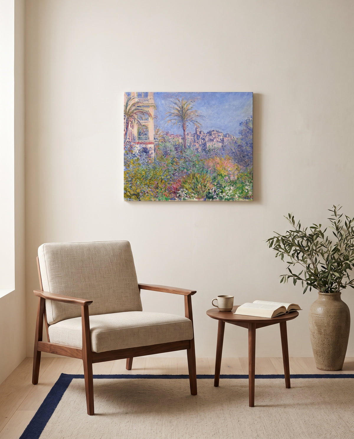 Villas at Bordighera by Claude Monet as a stretched canvas above a linen lounge chair in a reading corner