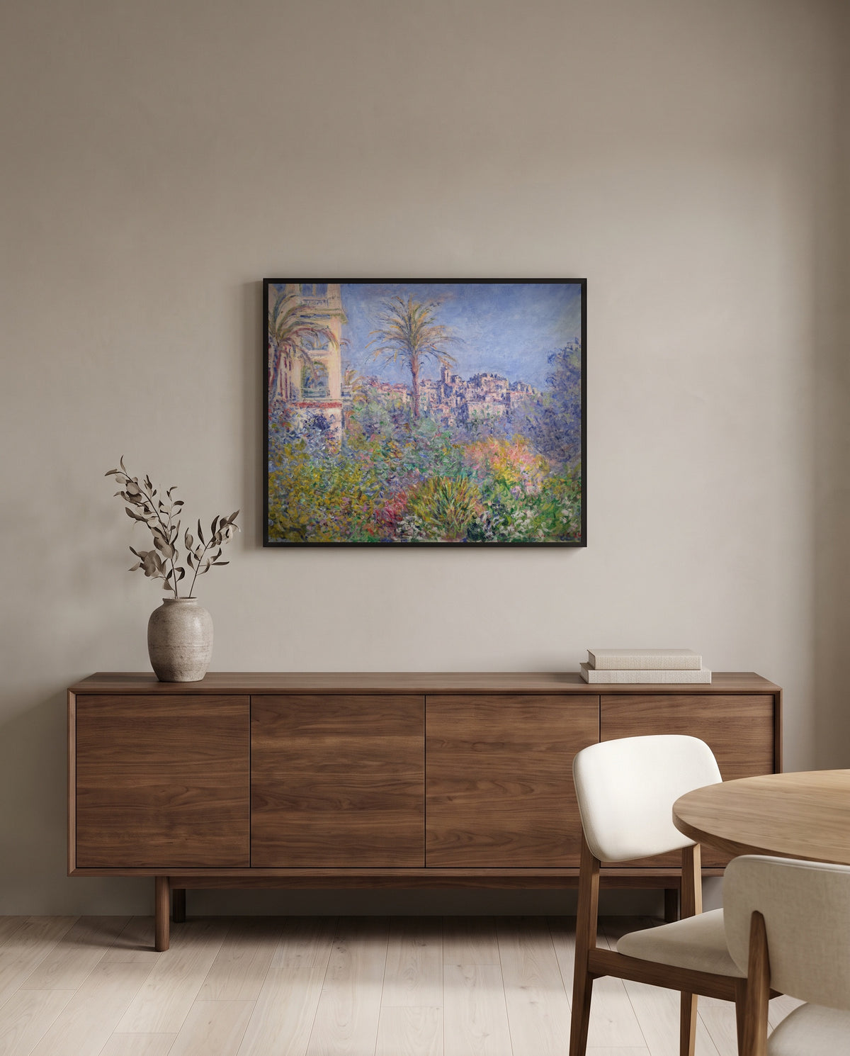 Villas at Bordighera by Claude Monet in a black frame above a walnut sideboard in a dining room