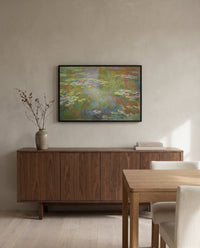 Water Lily Pond, 1917–19 by Claude Monet in a black frame above a walnut sideboard in a dining room