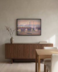 Waterloo Bridge, Gray Day by Claude Monet in a black frame above a walnut sideboard in a dining room