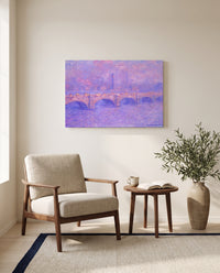 Waterloo Bridge, Sunlight by Claude Monet as a stretched canvas above a linen lounge chair in a reading corner