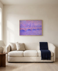 Waterloo Bridge, Sunlight by Claude Monet framed in natural oak above a cream sofa in a warm living room