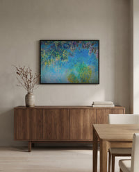 Wisteria by Claude Monet in a black frame above a walnut sideboard in a dining room