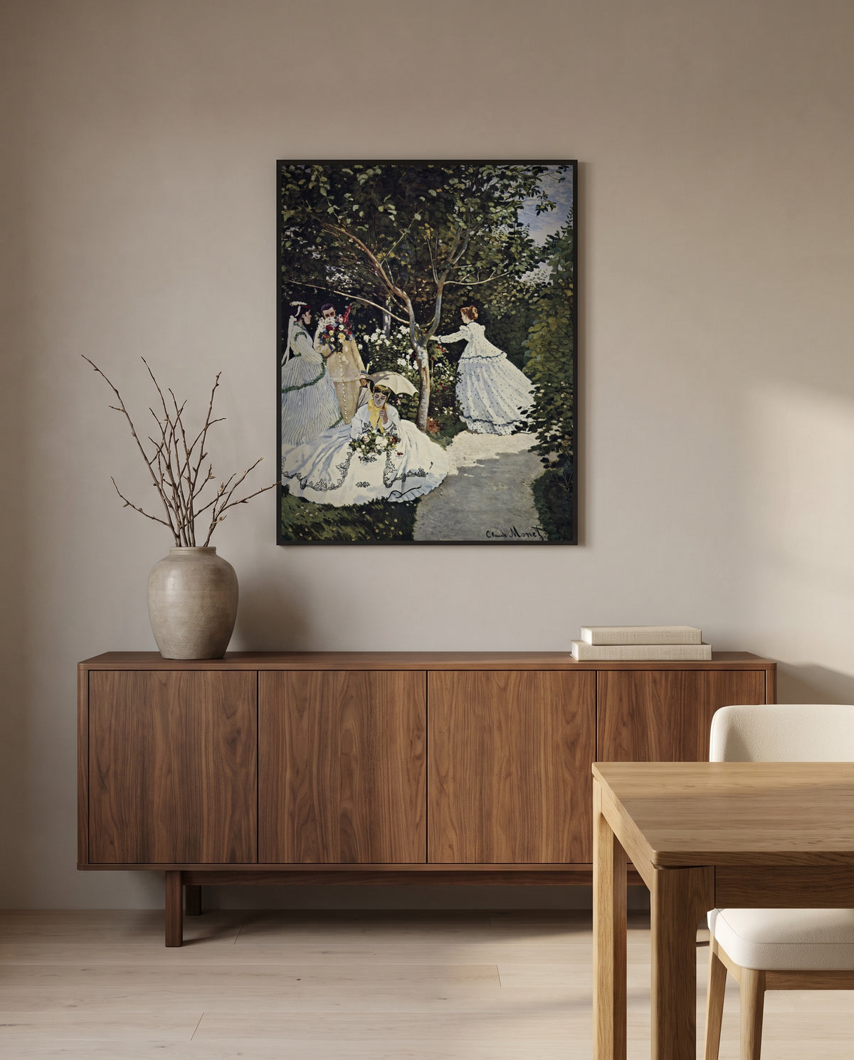 Women in the Garden by Claude Monet in a black frame above a walnut sideboard in a dining room