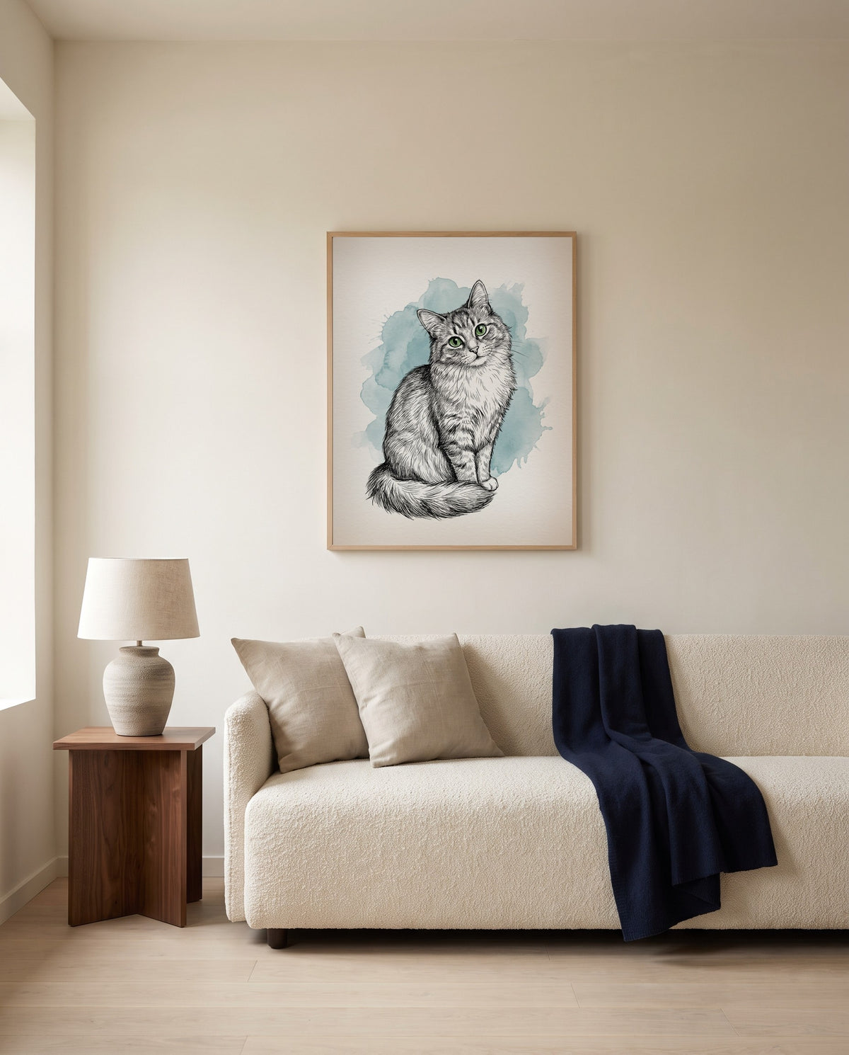 Custom illustrated cat portrait, framed above a sofa in a living room