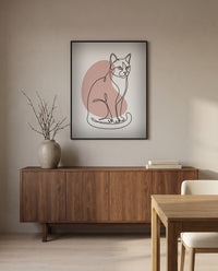 Custom line art cat portrait, in a black frame in a dining room