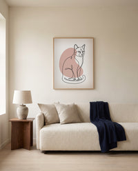 Custom line art cat portrait, framed above a sofa in a living room