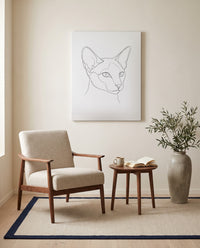 Custom line art cat portrait, on canvas in a reading corner