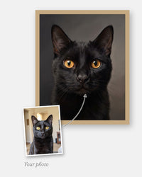 The customer's photo laid on the corner of the finished custom realistic cat portrait, framed in natural wood