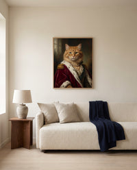 Custom royal cat portrait, framed above a sofa in a living room
