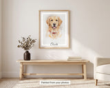 Custom watercolor pet portrait of a golden retriever in a natural wood frame above an entryway bench