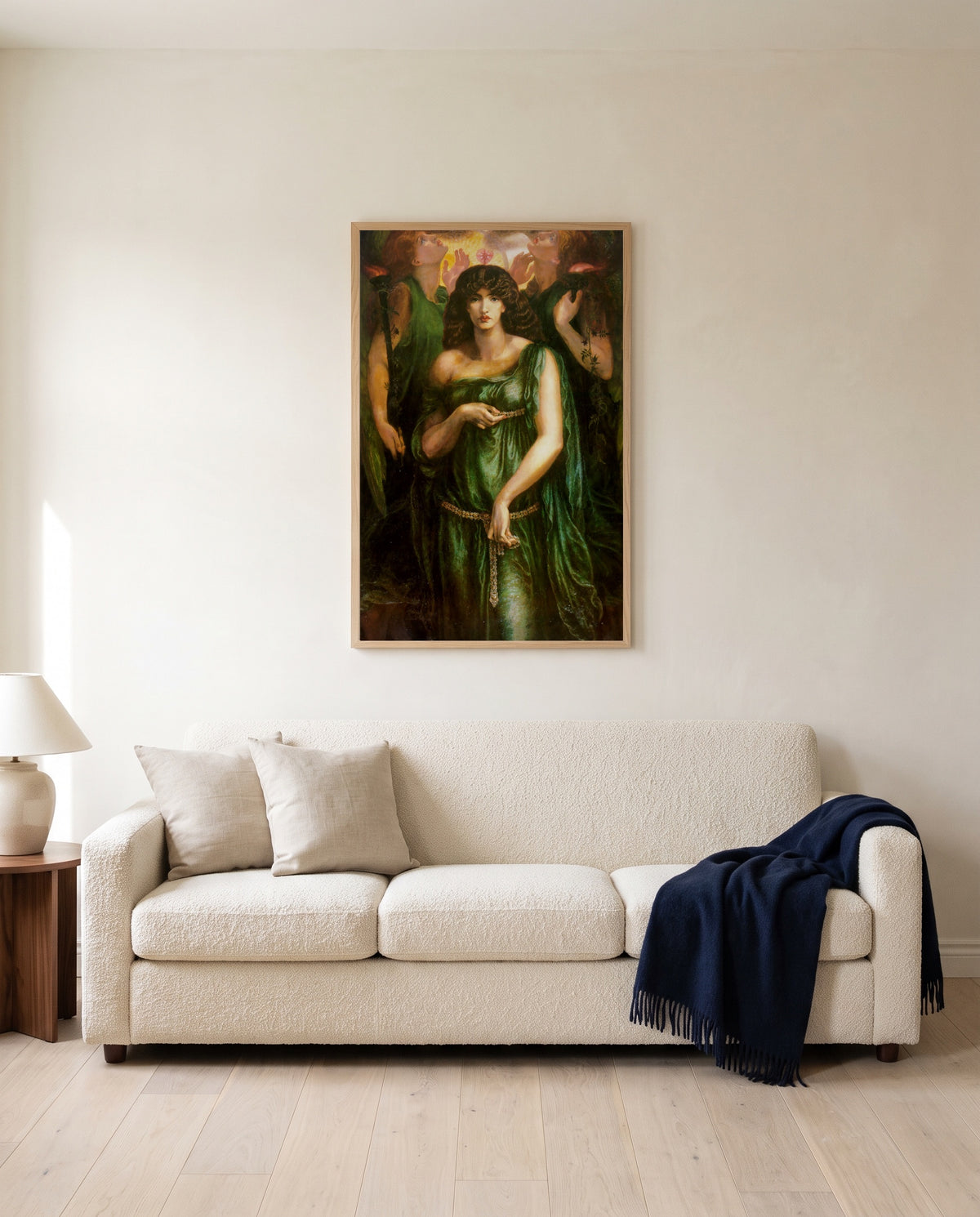 Astarte Syriaca by Dante Gabriel Rossetti framed in natural oak above a cream sofa in a warm living room