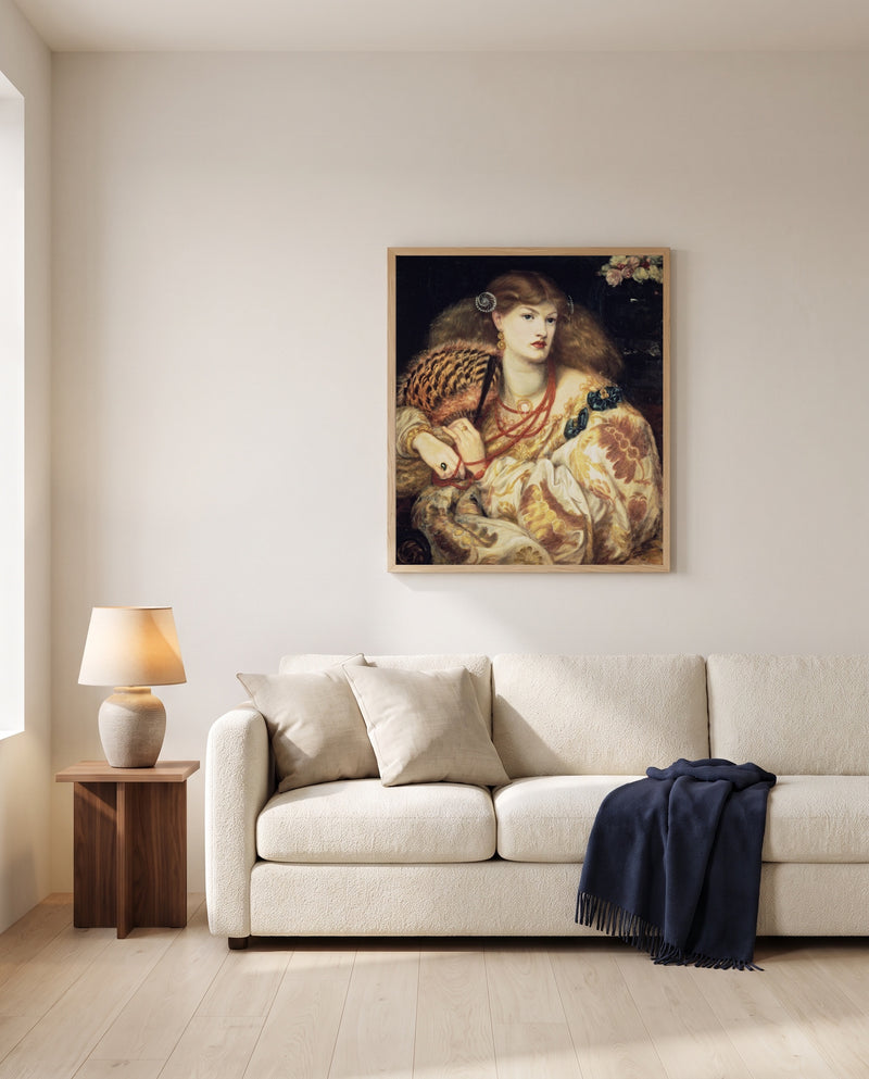 Monna Vanna by Dante Gabriel Rossetti framed in natural oak above a cream sofa in a warm living room