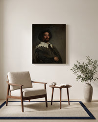 Juan de Pareja by Diego Velázquez as a stretched canvas above a linen lounge chair in a reading corner