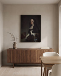 The Lady with a Fan by Diego Velázquez in a black frame above a walnut sideboard in a dining room