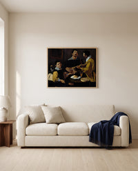 Three Musicians by Diego Velázquez framed in natural oak above a cream sofa in a warm living room