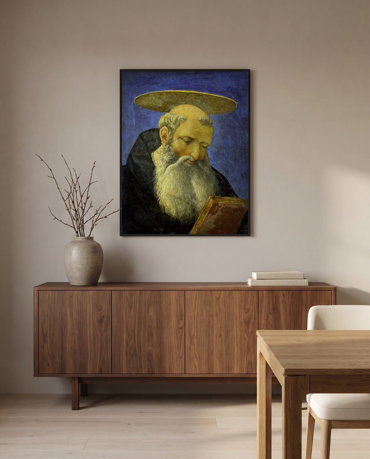 Head of a Bearded Saint by Domenico Veneziano in a black frame above a walnut sideboard in a dining room