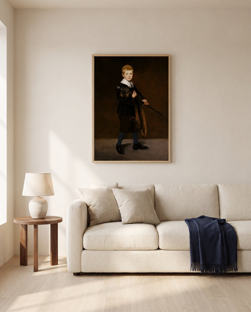 Boy Carrying a Sword by Édouard Manet framed in natural oak above a cream sofa in a warm living room