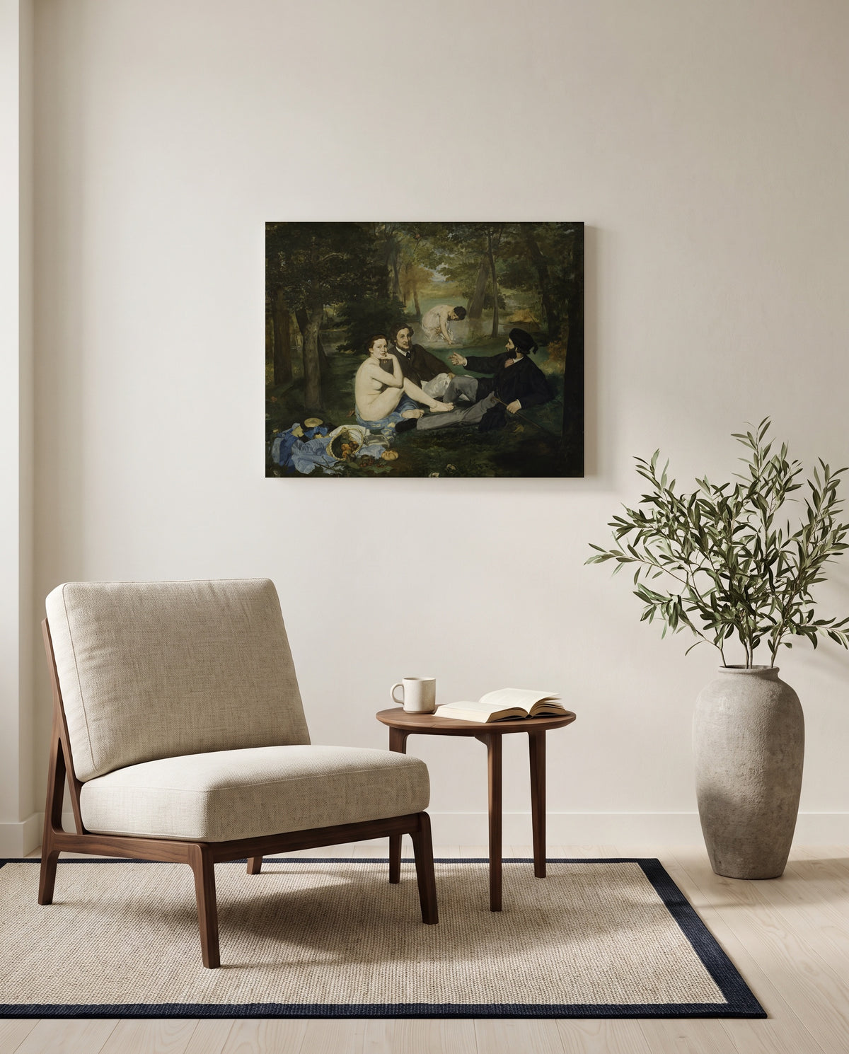 Le Déjeuner sur l’herbe by Édouard Manet as a stretched canvas above a linen lounge chair in a reading corner