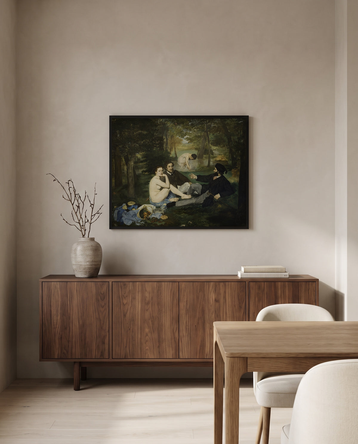 Le Déjeuner sur l’herbe by Édouard Manet in a black frame above a walnut sideboard in a dining room