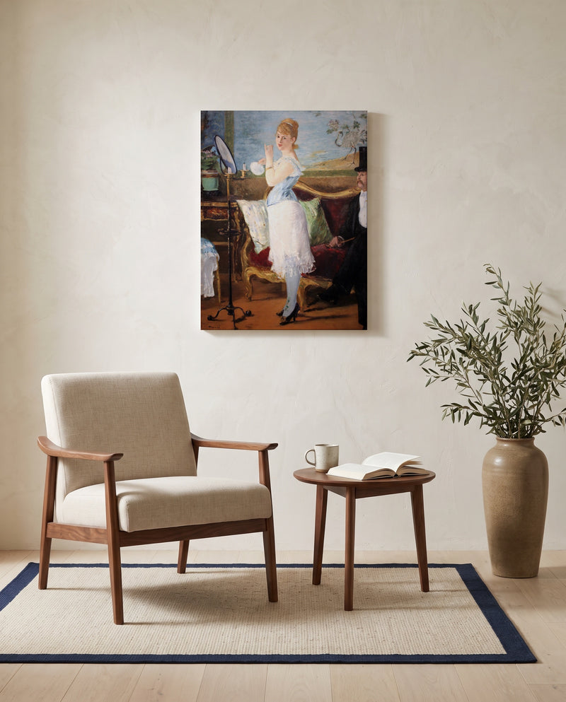 Nana by Édouard Manet as a stretched canvas above a linen lounge chair in a reading corner