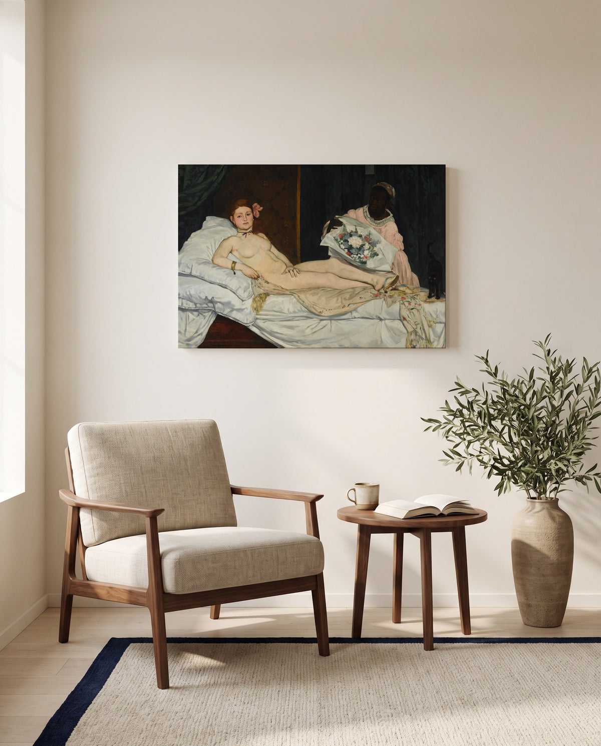 Olympia by Édouard Manet as a stretched canvas above a linen lounge chair in a reading corner