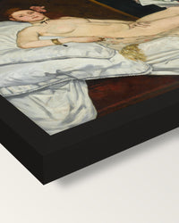 Olympia by Édouard Manet framed print, corner close-up: black moulding, mitred, the print set just below its edge
