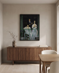 The Balcony by Édouard Manet in a black frame above a walnut sideboard in a dining room