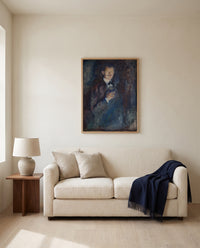 Self-Portrait with Cigarette by Edvard Munch framed in natural oak above a cream sofa in a warm living room