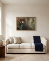 Spring by Edvard Munch framed in natural oak above a cream sofa in a warm living room