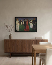 The Dance of Life by Edvard Munch in a black frame above a walnut sideboard in a dining room