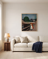 The Girls on the Bridge by Edvard Munch framed in natural oak above a cream sofa in a warm living room